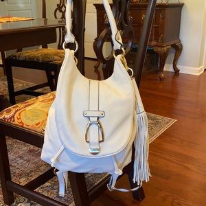 White leather woman’s backpack purse